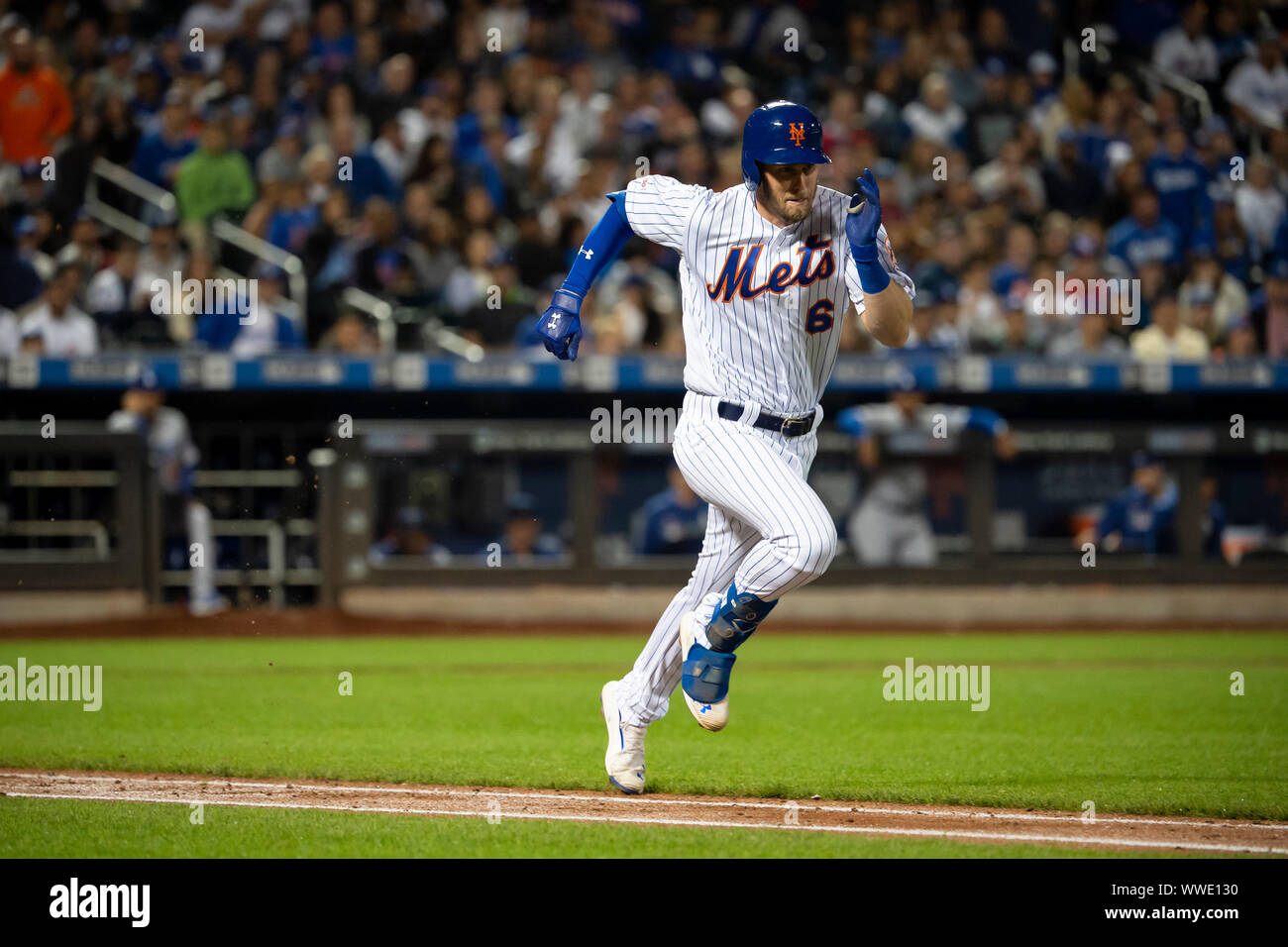 Queens, New York, USA. 13th Sep, 2019. New York Mets left fielder Jeff McNeil (6) hustles down the first base line during the game between The New York Mets and The Los Angeles Dodgers at Citi Field in Queens, New York. Mandatory credit: Kostas Lymperopoulos/CSM/Alamy Live News Stock Photo