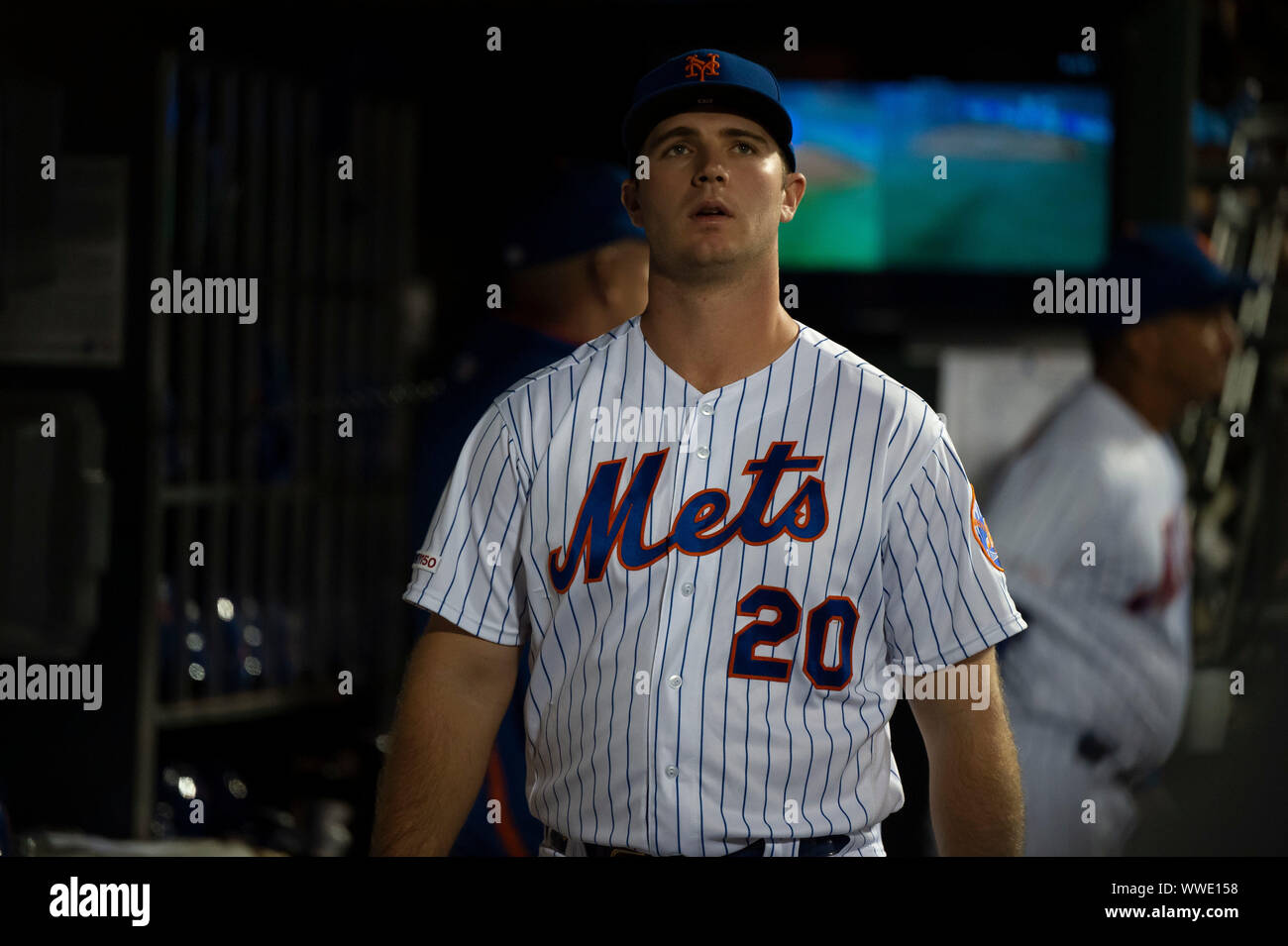 Queens, New York, USA. 13th Sep, 2019. New York Mets first baseman Pete Alonso (20) looks on from the dugout during the game between The New York Mets and The Los Angeles Dodgers at Citi Field in Queens, New York. Mandatory credit: Kostas Lymperopoulos/CSM/Alamy Live News Stock Photo