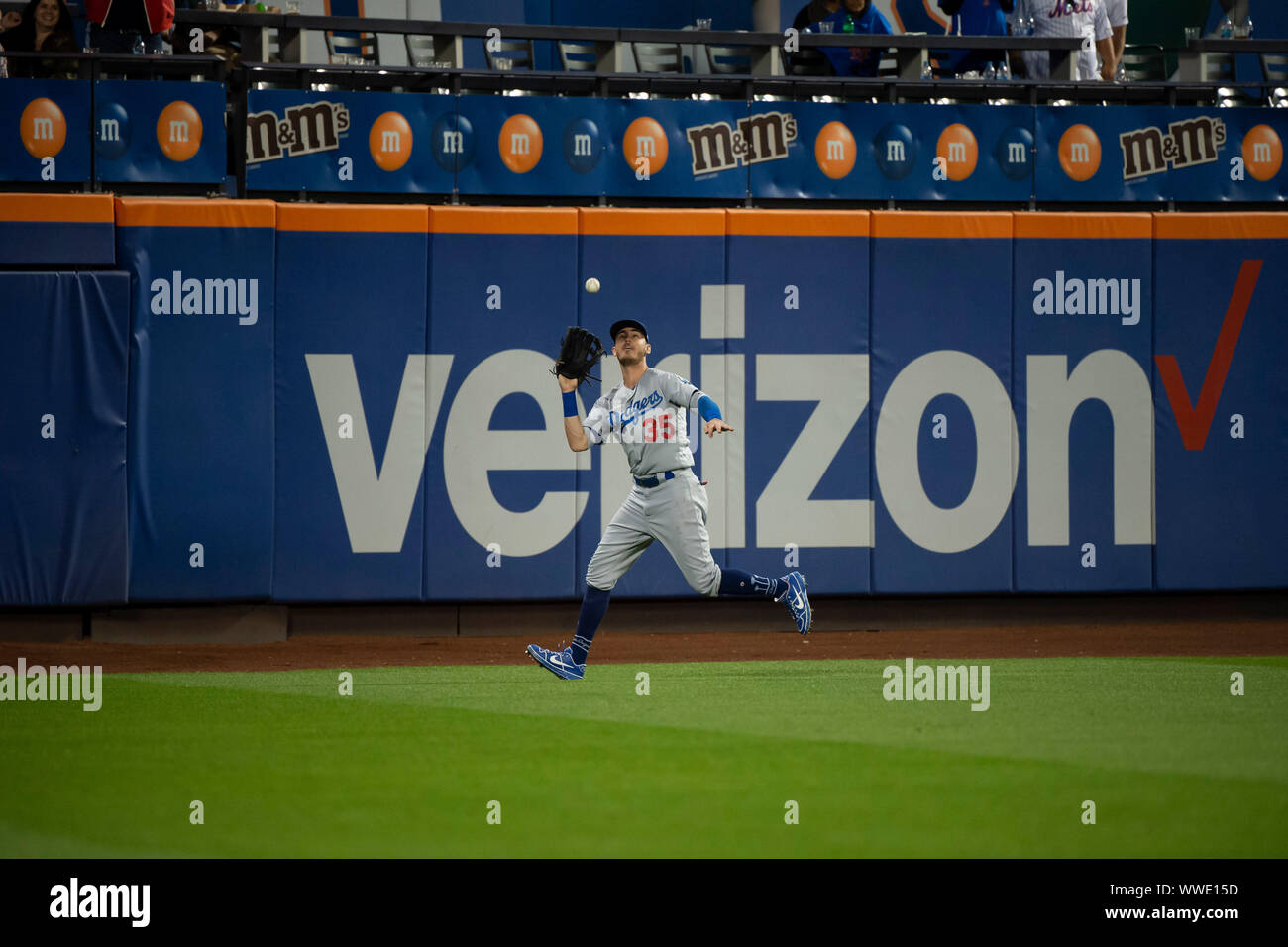Queens, New York, USA. 13th Sep, 2019. Los Angeles Dodgers right fielder Cody Bellinger (35) tracks down a fly ball during the game between The New York Mets and The Los Angeles Dodgers at Citi Field in Queens, New York. Mandatory credit: Kostas Lymperopoulos/CSM/Alamy Live News Stock Photo