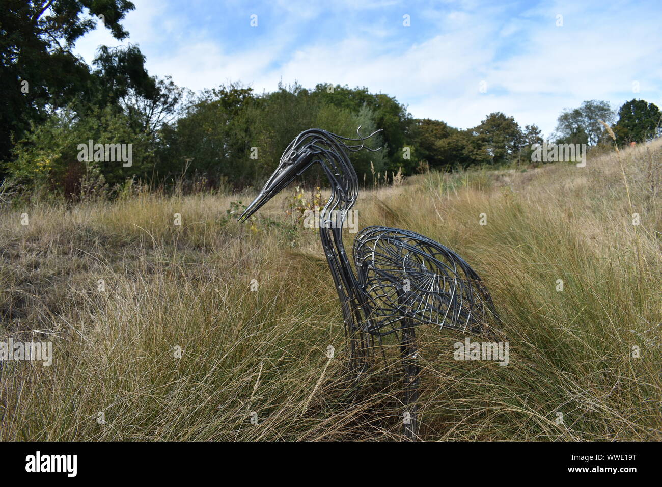 Heron by Ptolemy Elrington, made from supermarket shopping trolleys. Part of the ROCLA Art Trail in Redhouse Park in Milton Keynes. Stock Photo