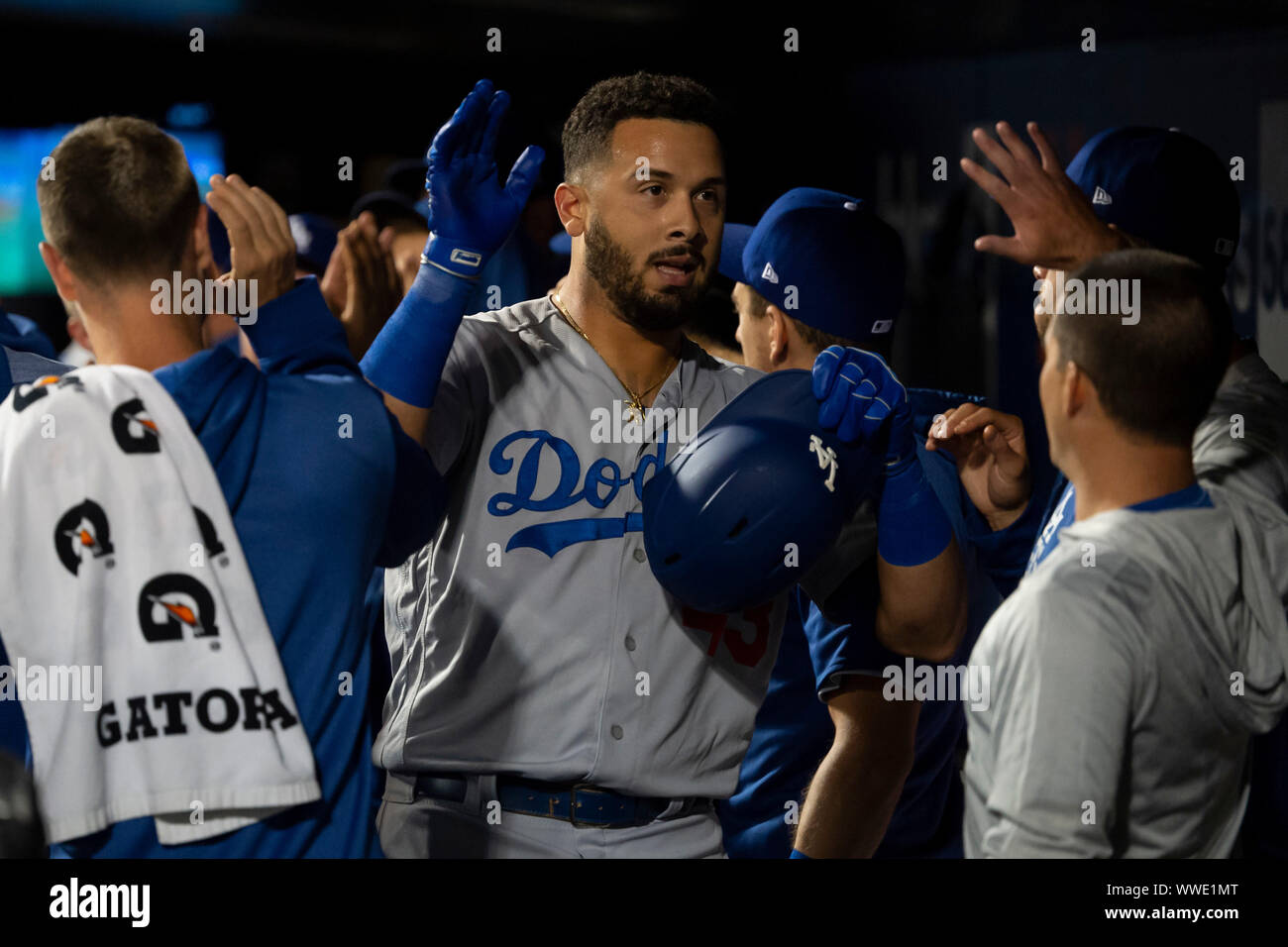 Queens, New York, USA. 13th Sep, 2019. Los Angeles Dodgers third baseman Edwin Rios (43) celebrates in the dugout after a home run during the game between The New York Mets and The Los Angeles Dodgers at Citi Field in Queens, New York. Mandatory credit: Kostas Lymperopoulos/CSM/Alamy Live News Stock Photo