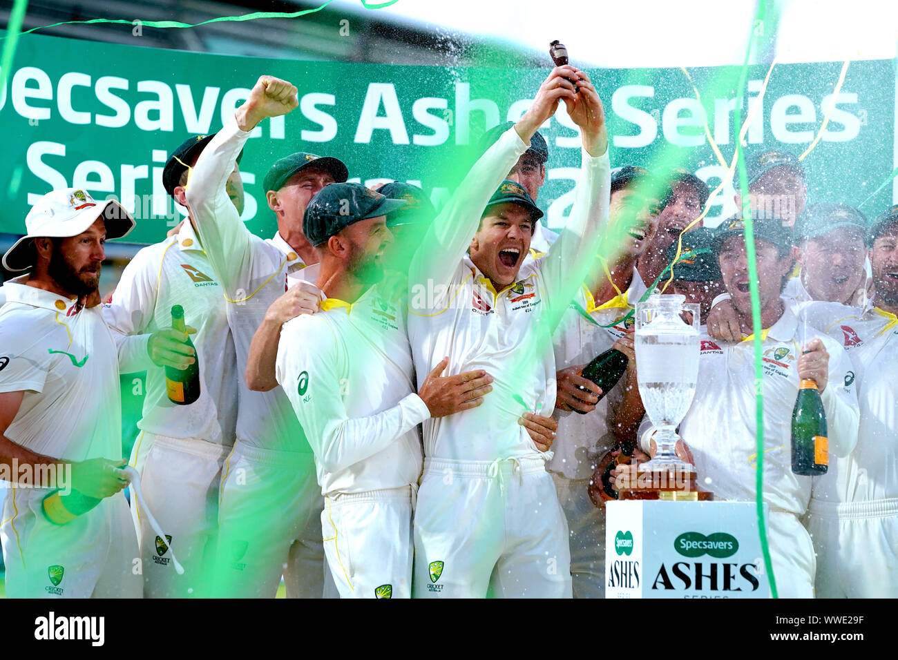Australia players celebrate retaining the Ashes at the end of the fifth