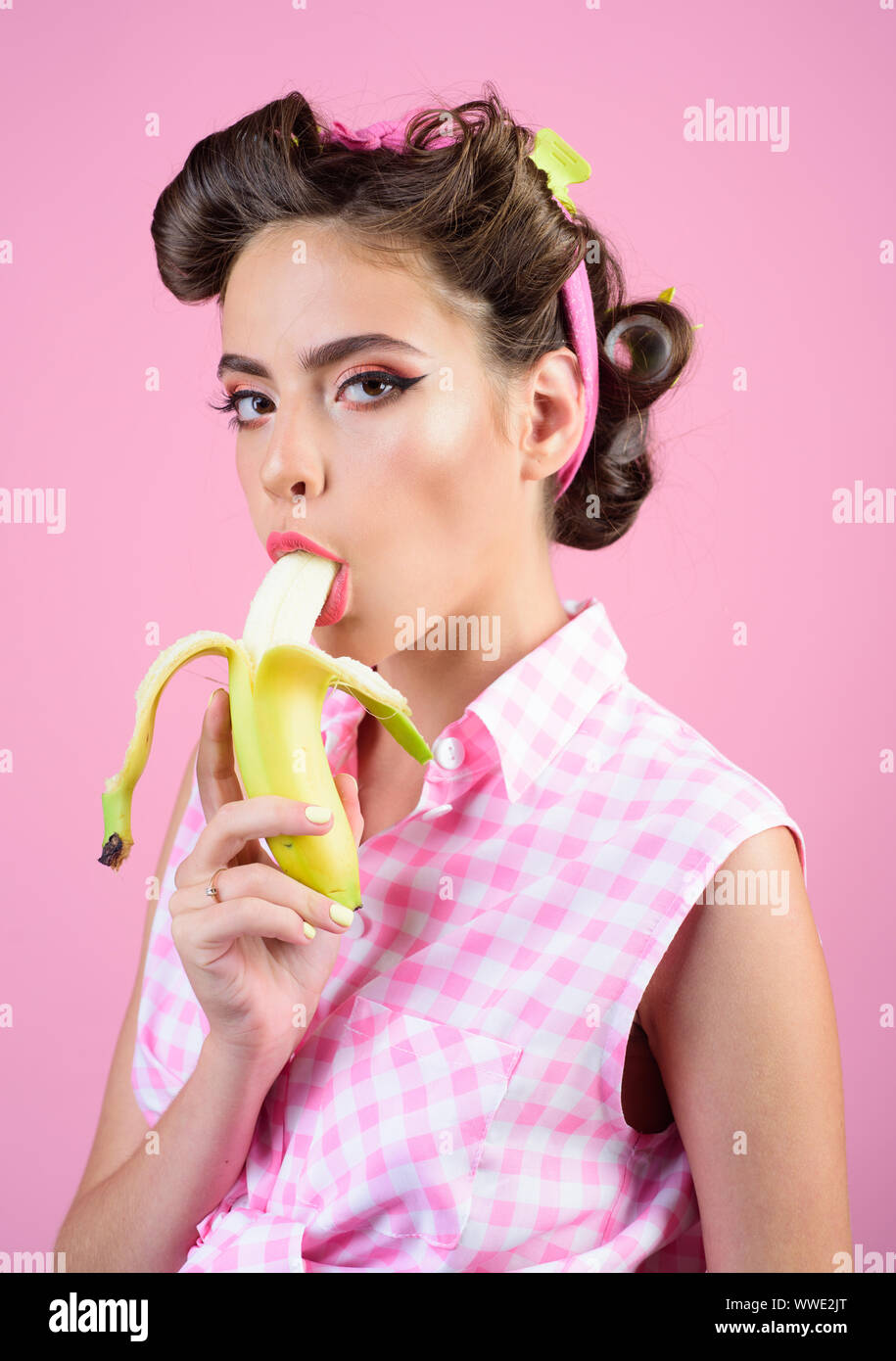 pretty girl in vintage style. pin up woman with trendy makeup. pinup girl  with fashion hair. banana dieting. retro woman eating banana. Only fresh  and Stock Photo - Alamy