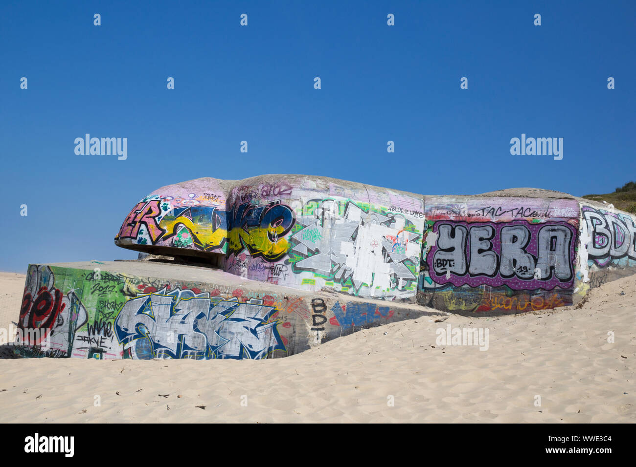 Grafitti on WWII sea defences at Cap Feret, France Stock Photo
