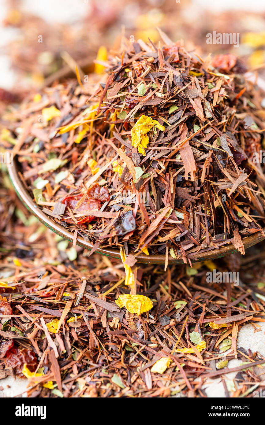 Rooibos tea leaves with dried fruits and flowers Stock Photo Alamy