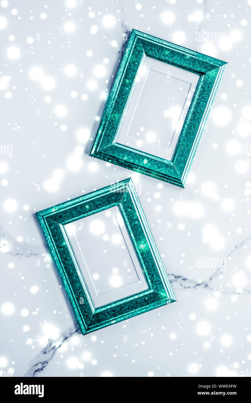 Art gallery, printable poster and online shop mockup concept - Emerald  green photo frame and glowing glitter snow on marble flatlay background for  Chr Stock Photo - Alamy