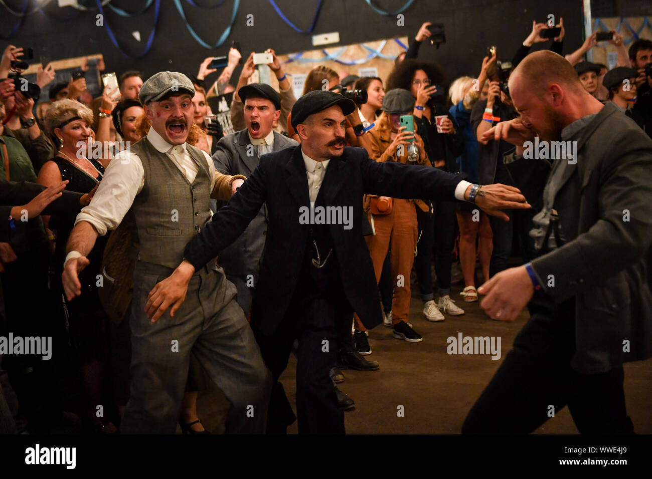 Actors recreate scenes during the Peaky Blinders Festival, in Birmingham. Stock Photo