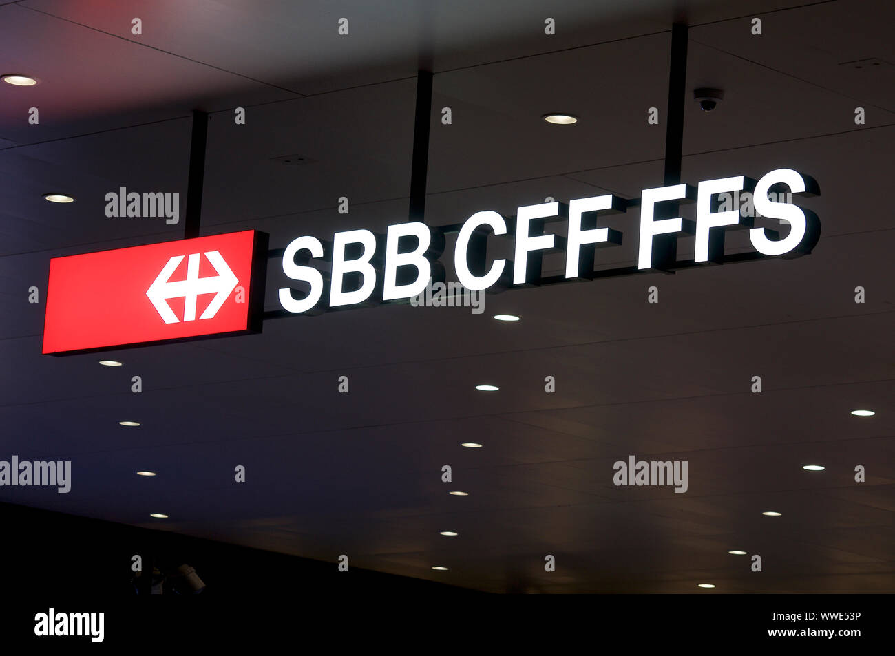 Lugano, Ticino, Switzerland - 17th August 2019 : View on the SBB / CFF / FFS (Swiss Federal Railways company) signage hanging from the ceiling of the Stock Photo