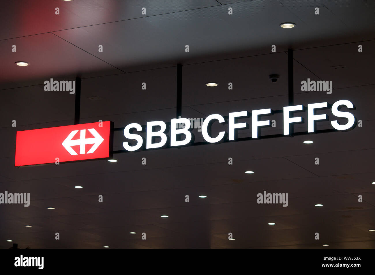 Lugano, Ticino, Switzerland - 17th August 2019 : View on the SBB / CFF / FFS (Swiss Federal Railways company) signage hanging from the ceiling of the Stock Photo