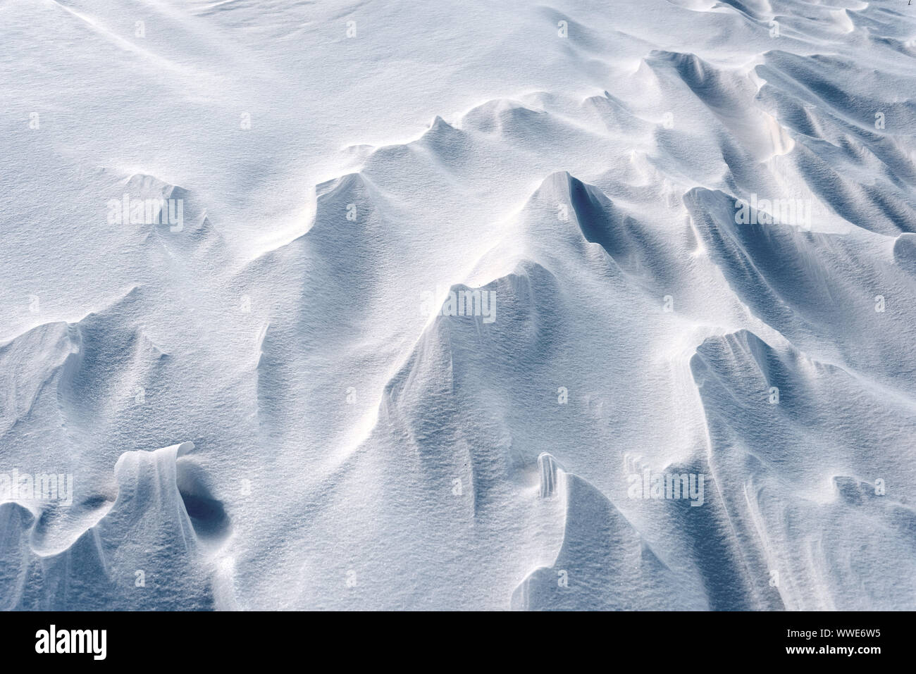 Winter snow blizzard patterns from a frozen season tundra with nobody in the image Stock Photo