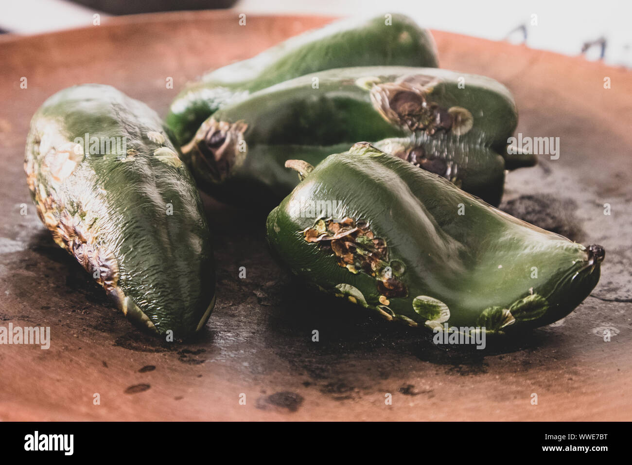 Roasting Poblano Chili Peppers in Mexico City Stock Photo