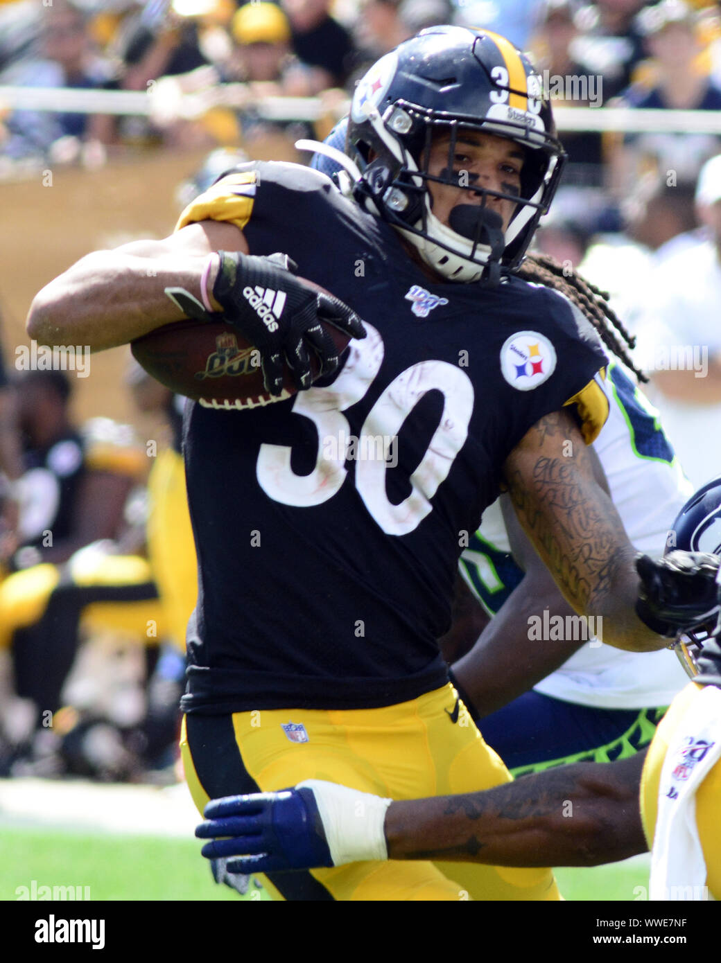 Pittsbugh, United States. 15th Sep, 2019. Seattle Seahawks stops Pittsburgh Steelers running back James Conner (30) for no gain at the end of the first quarter at Heinz Field in Pittsburgh on Sunday, Sept 15, 2019. Photo by Archie Carpenter/UPI Credit: UPI/Alamy Live News Stock Photo