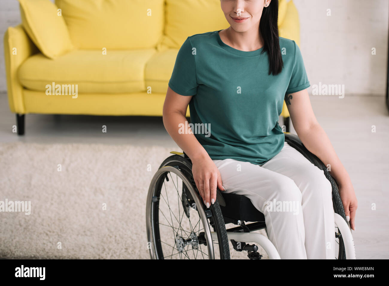 Disabled woman sitting in wheelchair hi-res stock photography and ...