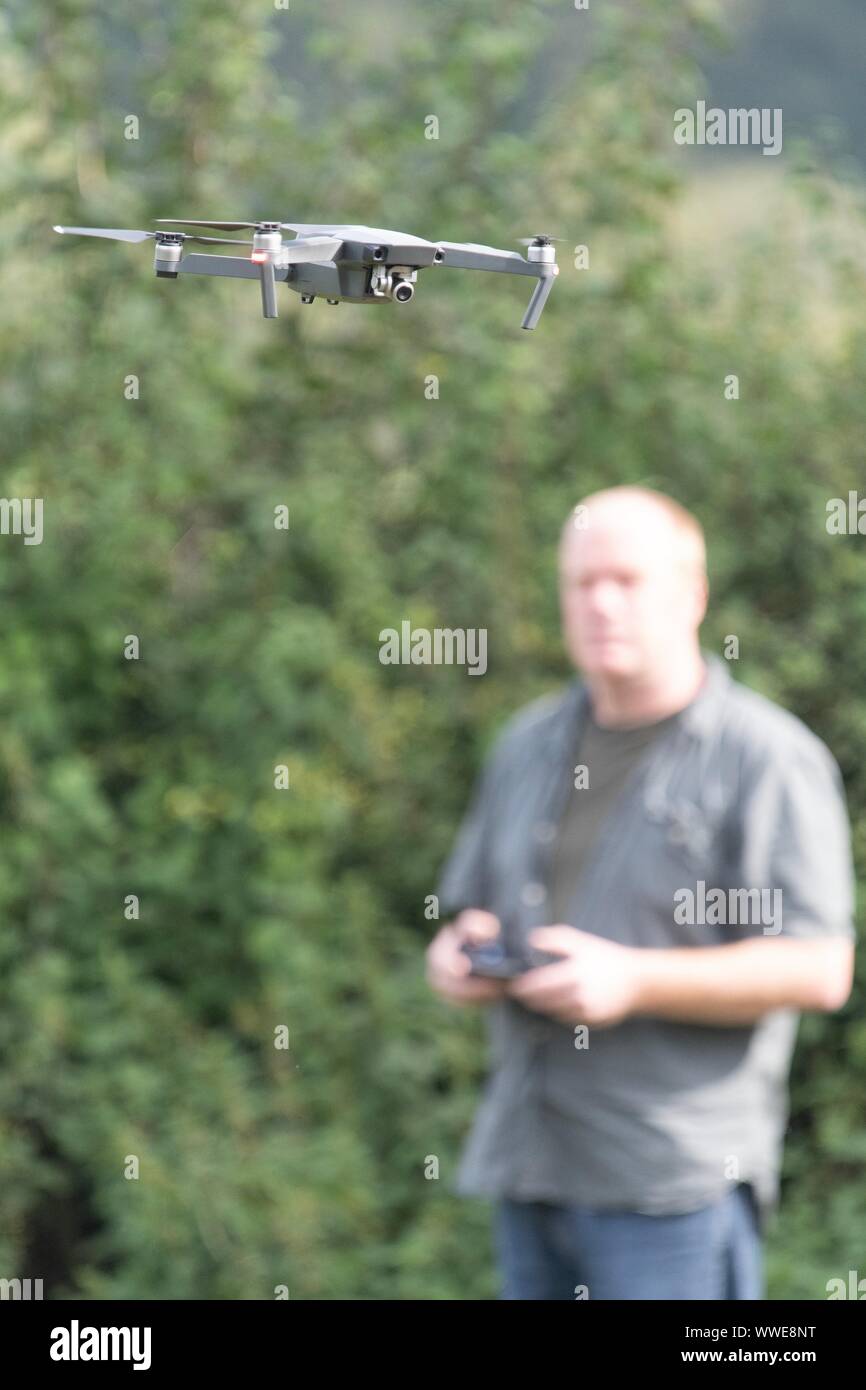 A white British male operating a drone Stock Photo