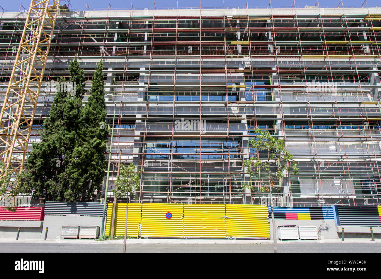 Building under renovation or construction with scaffolding Stock Photo