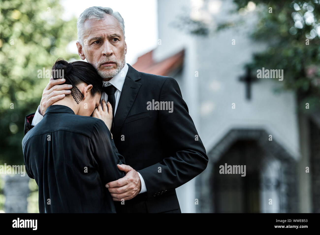 Woman embrace sad man hi-res stock photography and images - Alamy