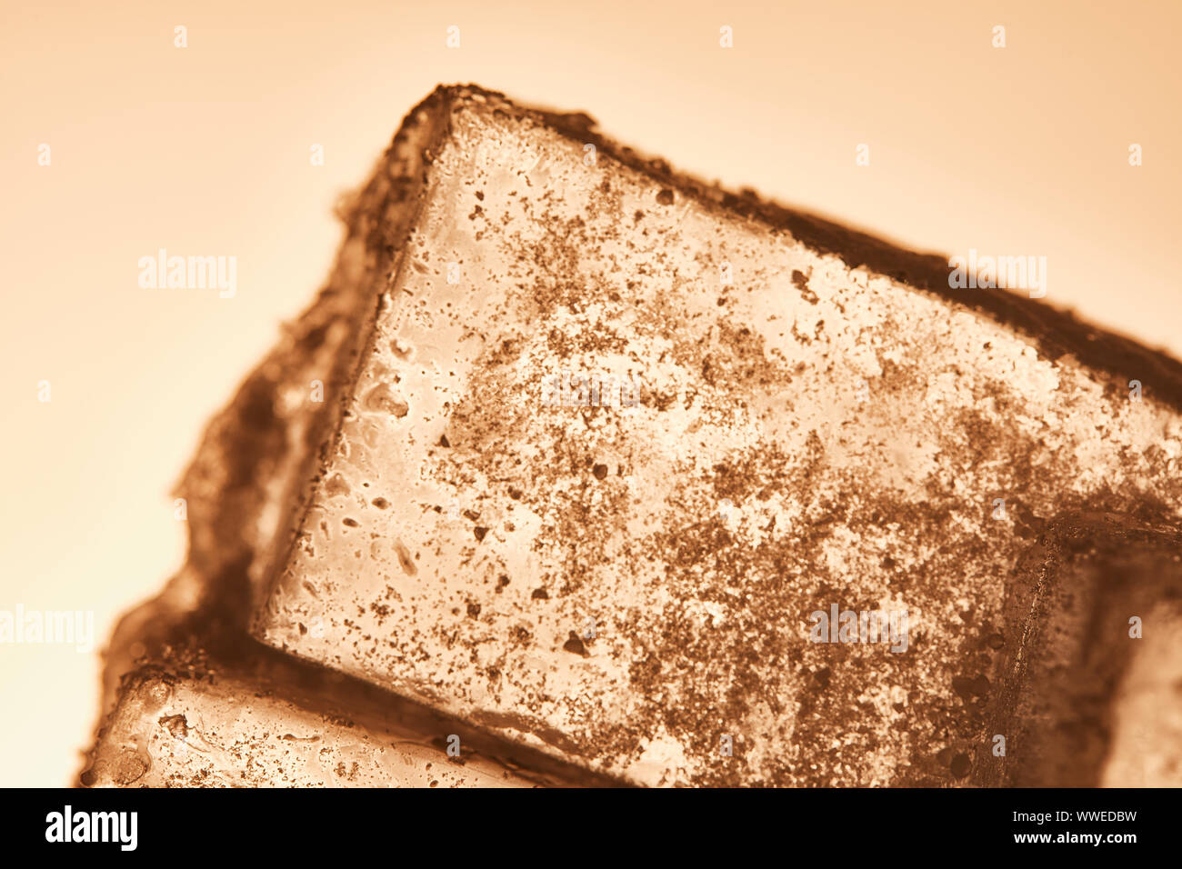 textured transparent ice cube on illuminated background Stock Photo - Alamy