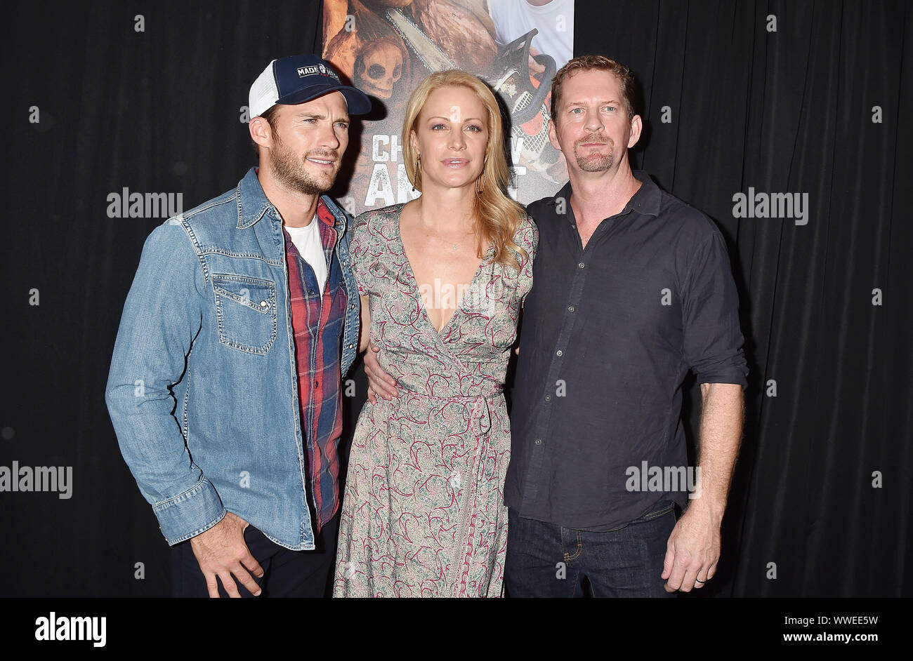 HOLLYWOOD, CA - SEPTEMBER 14: (L-R) Scott Eastwood, Alison Eastwood and Stacy Poitras attend the Stacy Poitras' Art Gallery Exhibition for documentary premiere of 'The Chainsaw Artist' held on September 14, 2019 in Hollywood, California. Stock Photo