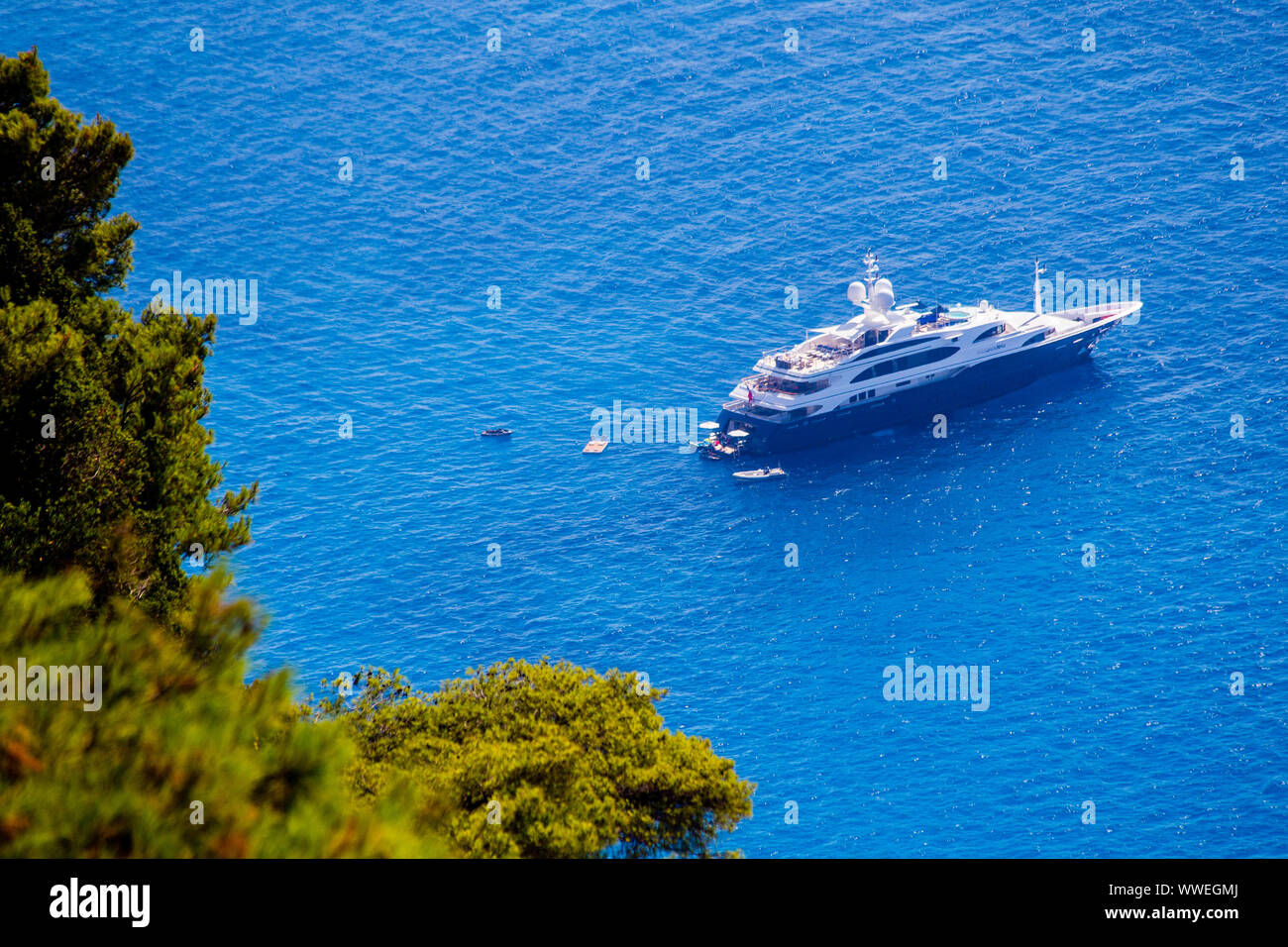 Andiamo luxury motor yacht (194.55ft /59.3m) moored of Egremni, west coast of Lefkada / Lefkas Island, Greece Stock Photo