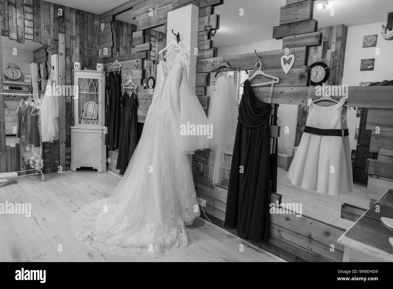 Bride Prep On A Wedding Day Wedding Dresses Hanging Up Ready To Be Worn By The Bride And Her 8882