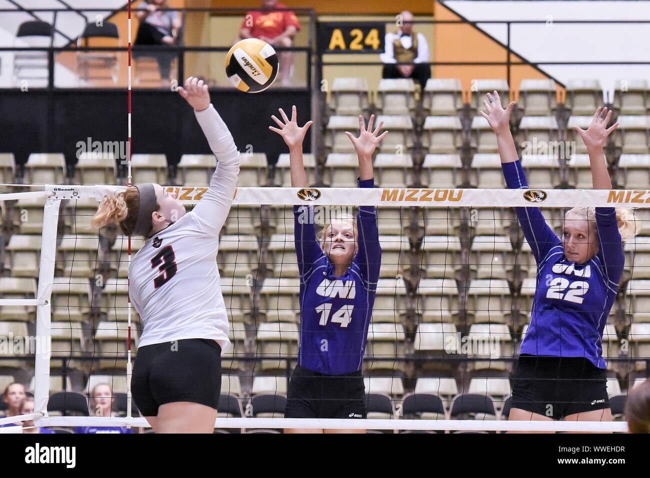 Sep 15, 2019: Austin Peay outside hitter Brooke Moore (3) hits against the blocking of University of Northern Iowa setter Rachel Koop (14) and University of Northern Iowa middle blocker Kat Barr (22) during part of the Mizzou Invitational tournament where University of Northern Iowa played Austin Peay, held at The Hearnes Center in Columbia, MO Richard Ulreich/CSM Stock Photo