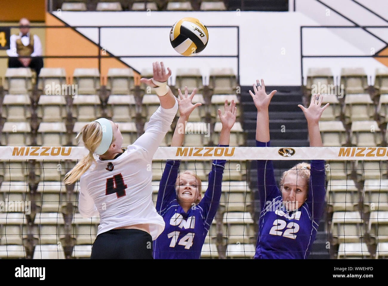 Sep 15, 2019: Austin Peay outside hitter/defensive specialist Chloe Stitt (4) tries to hit the ball past the blocking of University of Northern Iowa setter Rachel Koop (14) and University of Northern Iowa middle blocker Kat Barr (22) during part of the Mizzou Invitational tournament where University of Northern Iowa played Austin Peay, held at The Hearnes Center in Columbia, MO Richard Ulreich/CSM Stock Photo