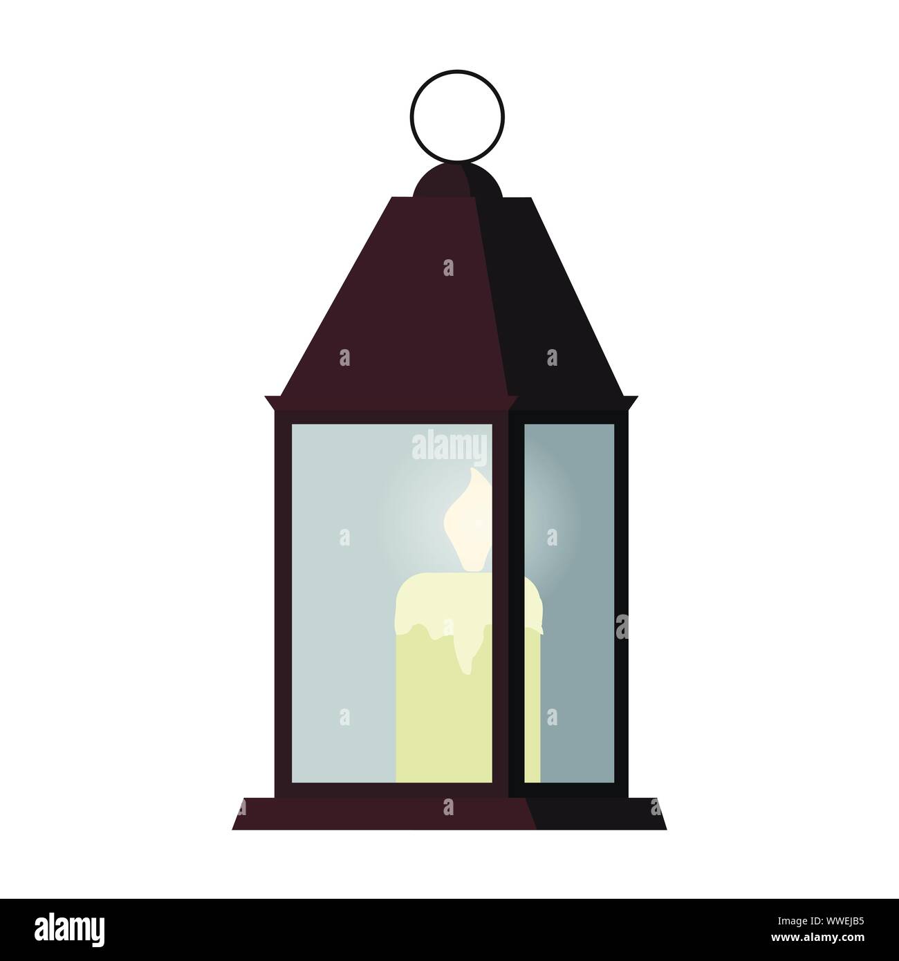 Candle light inside the rectangular metal candlestick with glass walls