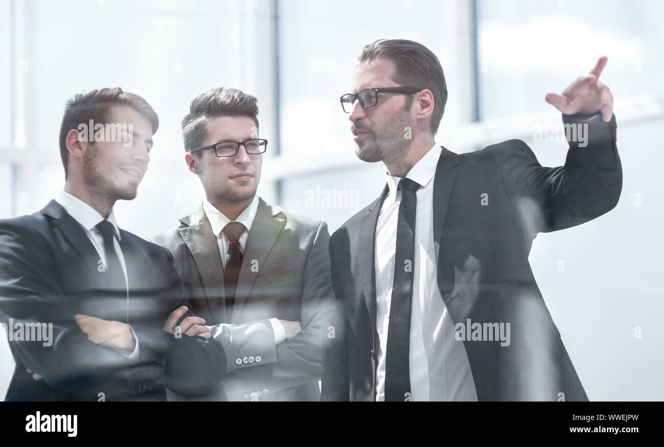 business partners standing near the office window Stock Photo - Alamy