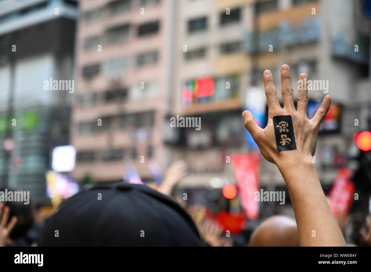 Hong Kong, Hong Kong Sar. 15th Sep, 2019. A demonstrator holds up an open hand to signify the five demands of the protest movement in Hong Kong on Sunday, September 15, 2019. Photo by Thomas Maresca/UPI Credit: UPI/Alamy Live News Stock Photo