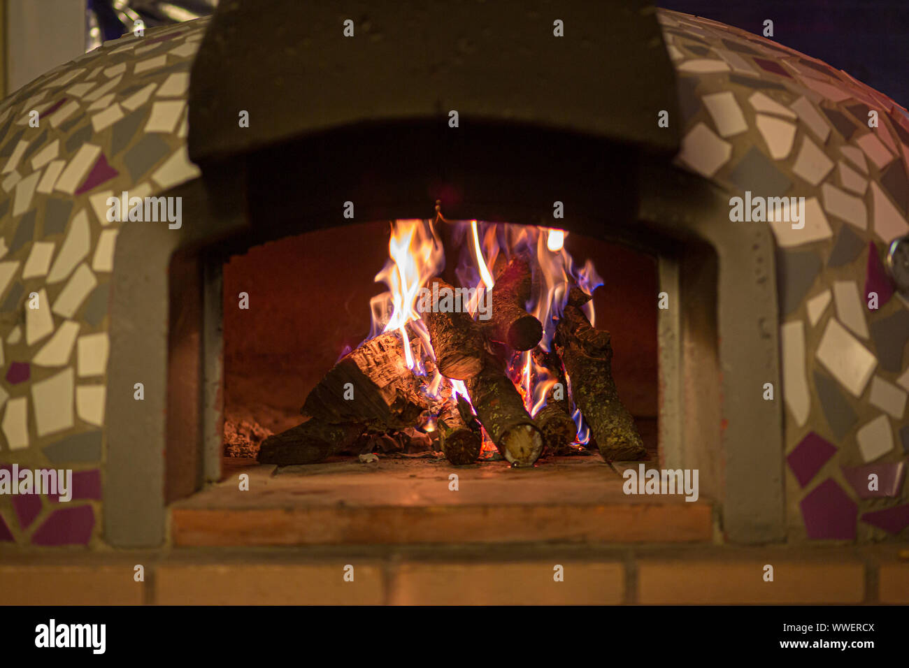 detail view of a newly lit wood oven and ready to put the homemade pizzas Stock Photo