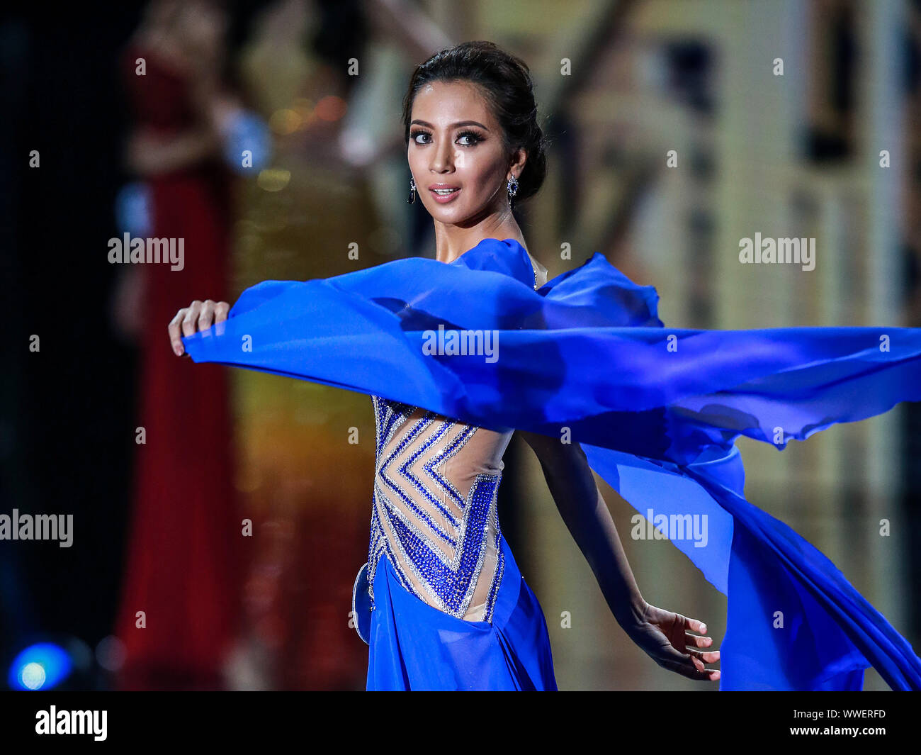 Quezon City, Philippines. 15th Sep, 2019. A contestant poses in her evening gown during the coronation night of Miss World Philippines 2019 in Quezon City, the Philippines, Sept. 15, 2019. Michelle Dee won the crown of Miss World Philippines 2019 and will represent the Philippines in the Miss world 2019 pageant in December. Credit: Rouelle Umali/Xinhua/Alamy Live News Stock Photo