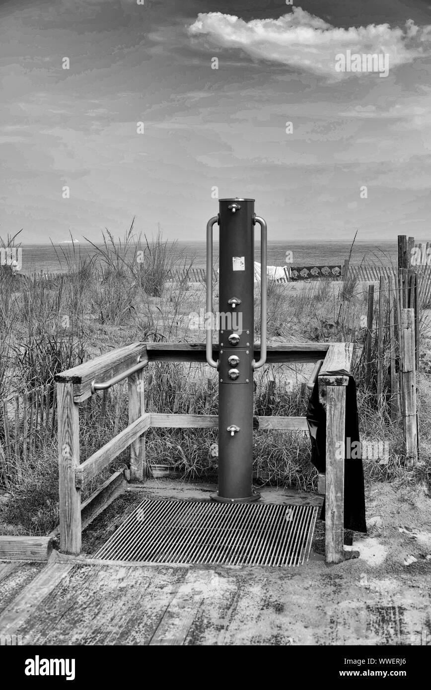 Beach shower station along the Rehoboth Beach boardwalk.  Rehoboth Beach (DE) boardwalk Stock Photo