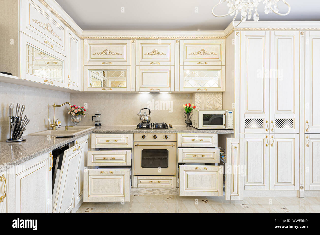 Luxury Modern Beige And Cream Colored Kitchen Interior Stock Photo