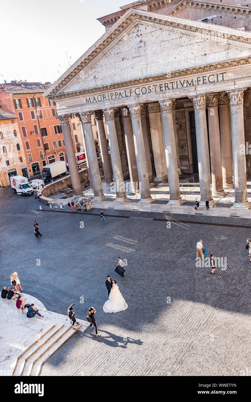 Rome, Italy - July 17, 2019: Young wedding couple by the Pantheon in Rome, Italy. Beautiful young wedding couple by the Pantheon in Rome, Italy Stock Photo