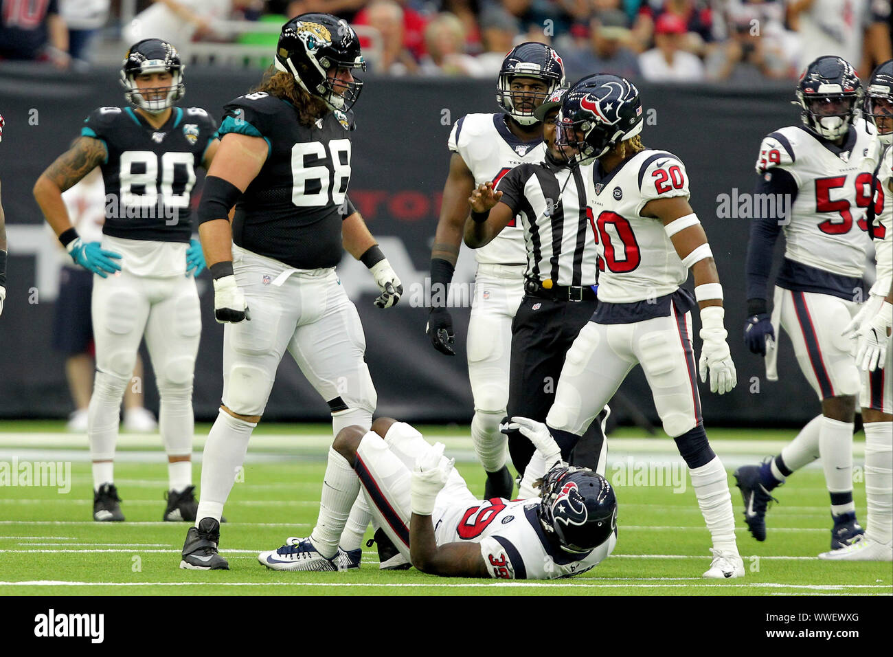 Houston, Texas, USA. 21st July, 2019. Jacksonville Jaguars guard Andrew  Norwell (68) and Houston Texans safety Justin Reid (20) exchange words  during the NFL regular season game between the Houston Texans and