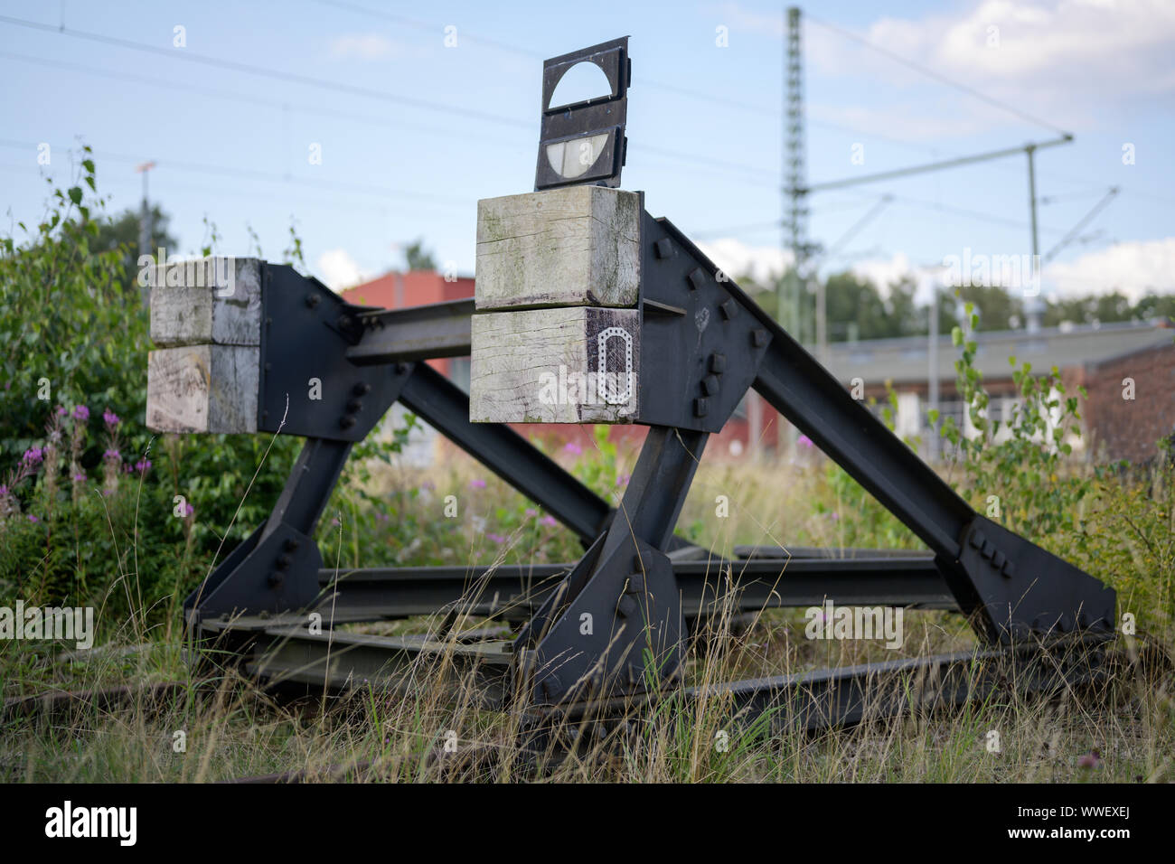 buffer stop at the end of a disused railway track, selected focus Stock Photo