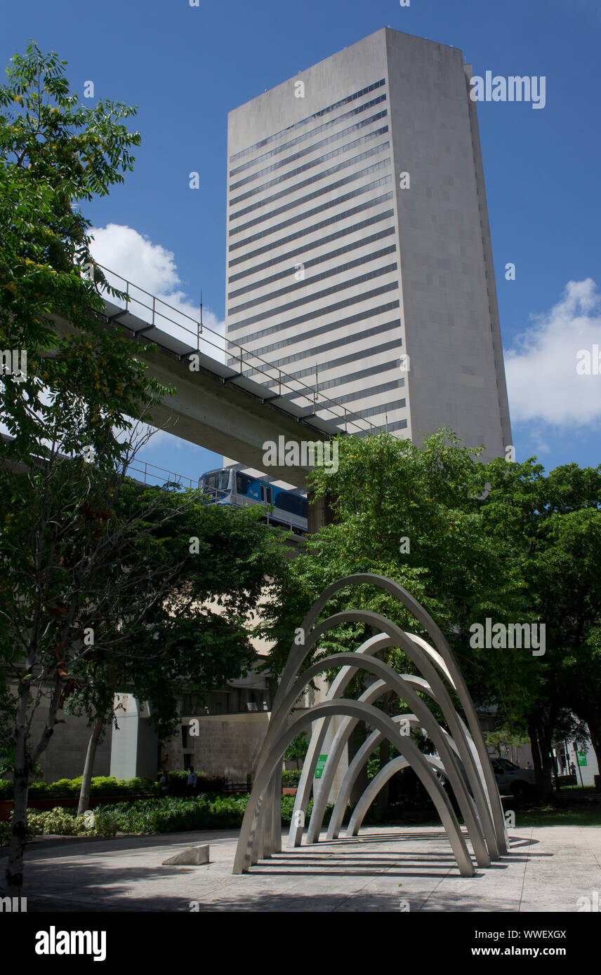 View of Metrorail and Metromover elevated tracks with Government Center building in Government district of Downtown Miami Stock Photo