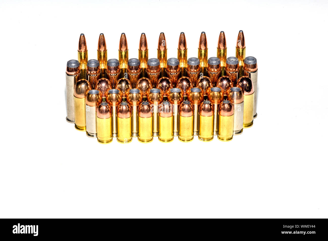 Various bullet calibers in rows with white background copy space Stock