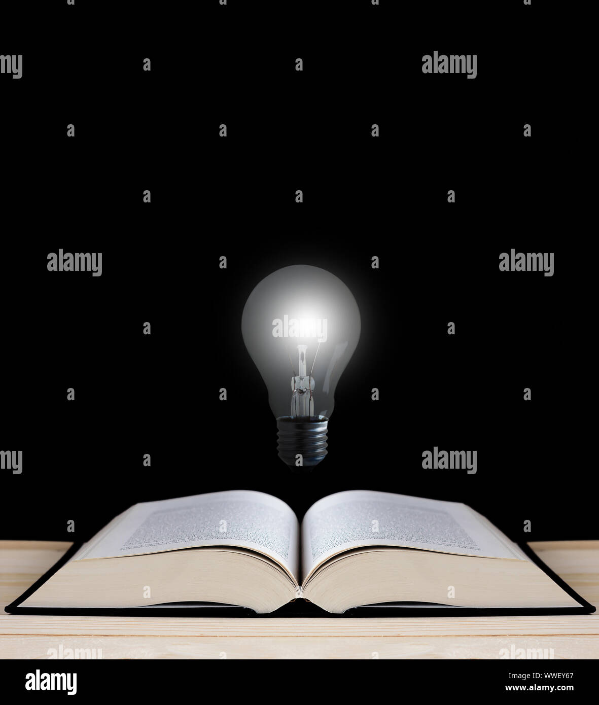 Education concept, knowledge management, light bulb and open book on ...