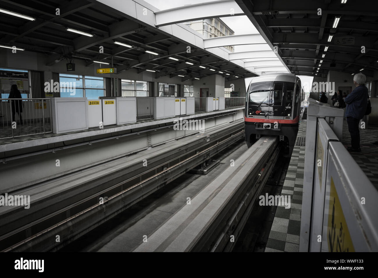 A monorail train arrives at Asahibashi station, Naha, Okinawa, Japan Stock Photo