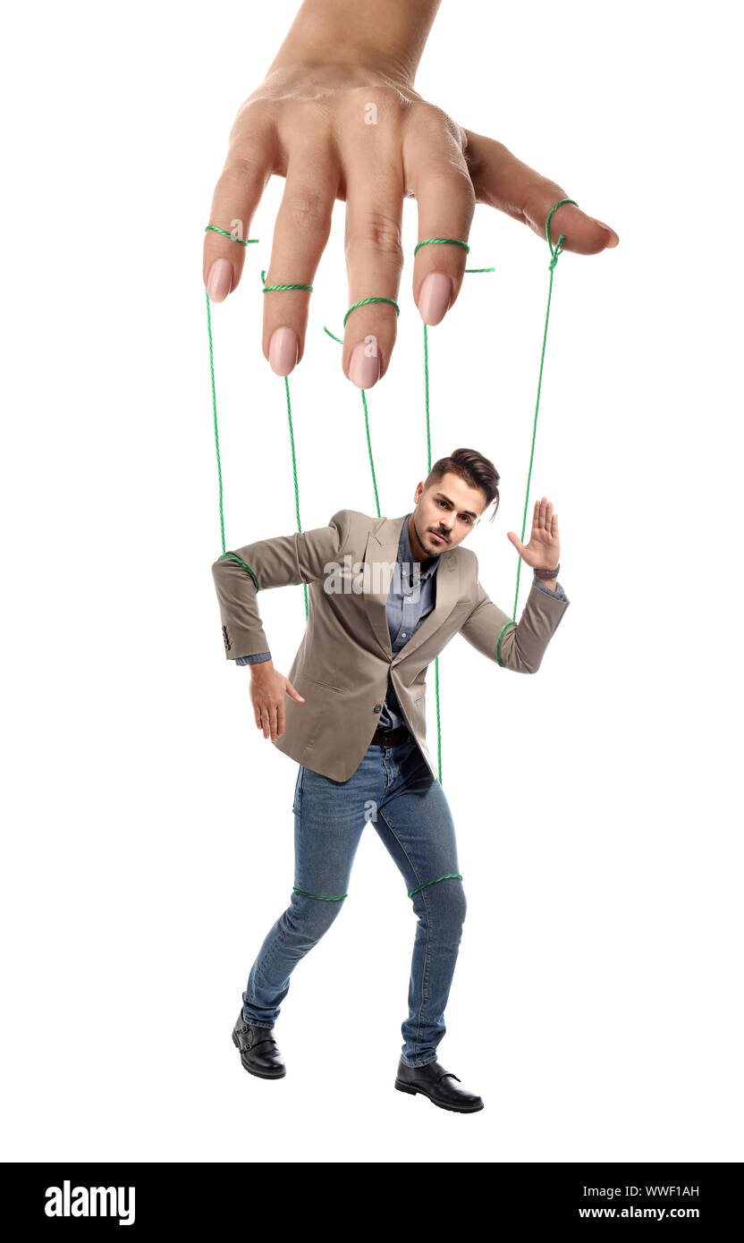 smiling female puppeteer holding male marionette isolated on grey Stock  Photo - Alamy