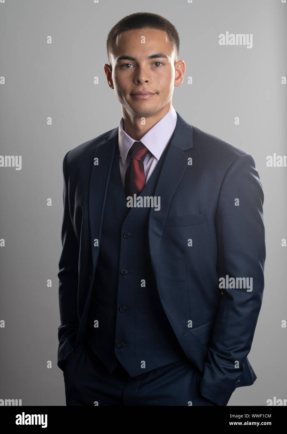 Handsome mixed race young man wearing business suit Stock Photo