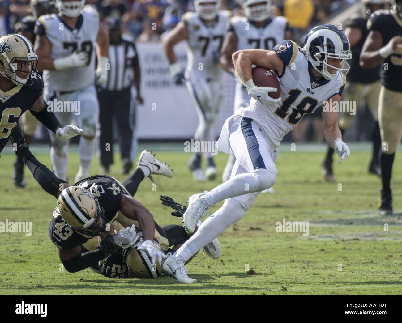 Los Angeles, United States. 15th Sep, 2019. Los Angeles Rams wide receiver Cooper Kupp (18) leaves New Orleans Saints defenders behind on his long second half reception at the Los Angeles Memorial Coliseum in Los Angeles, California on Sunday, September 15, 2019. The Rams defeated the Saints 27 - 9 to open their home season. Photo by Michael Goulding/UPI Credit: UPI/Alamy Live News Stock Photo