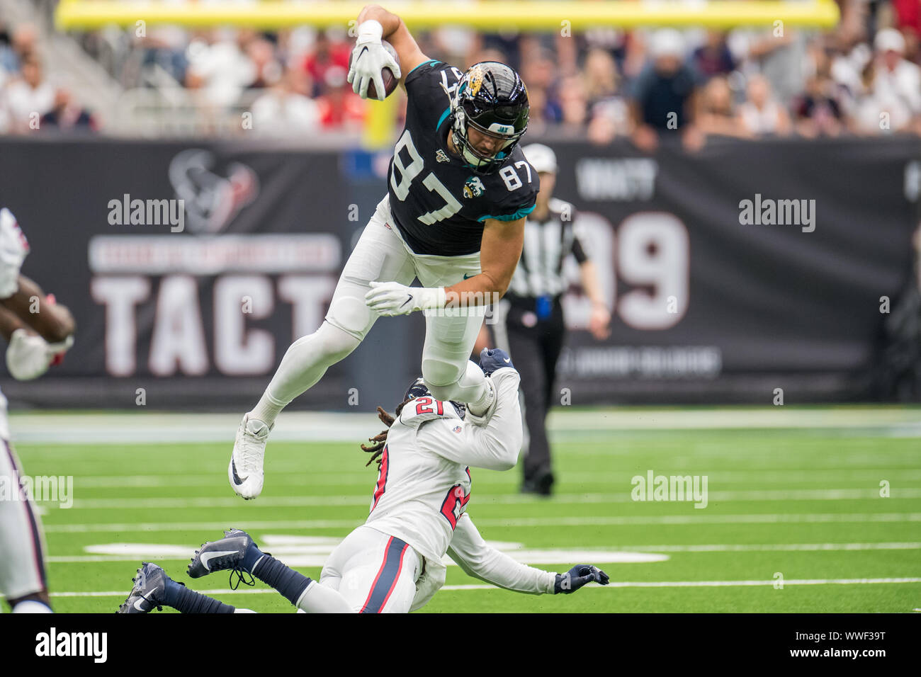 Houston, TX, USA. 15th Sep, 2019. Jacksonville Jaguars tight end Geoff Swaim (87) tries to leap over Houston Texans cornerback Bradley Roby (21) during the 2nd quarter of an NFL football game between the Jacksonville Jaguars and the Houston Texans at NRG Stadium in Houston, TX. The Texans won the game 13 to 12.Trask Smith/CSM/Alamy Live News Stock Photo