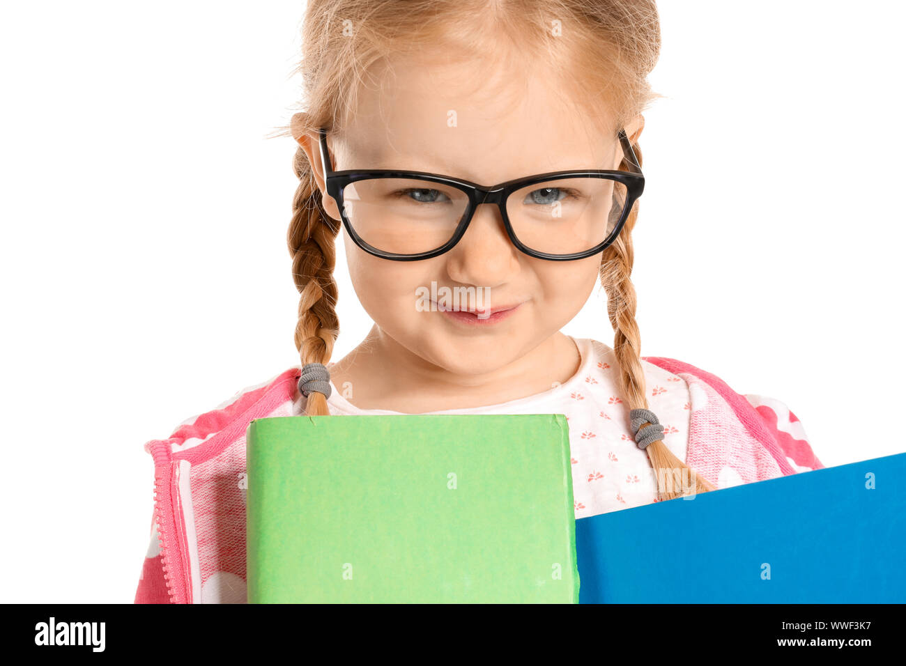 Portrait of adorable little girl with books on white background Stock ...