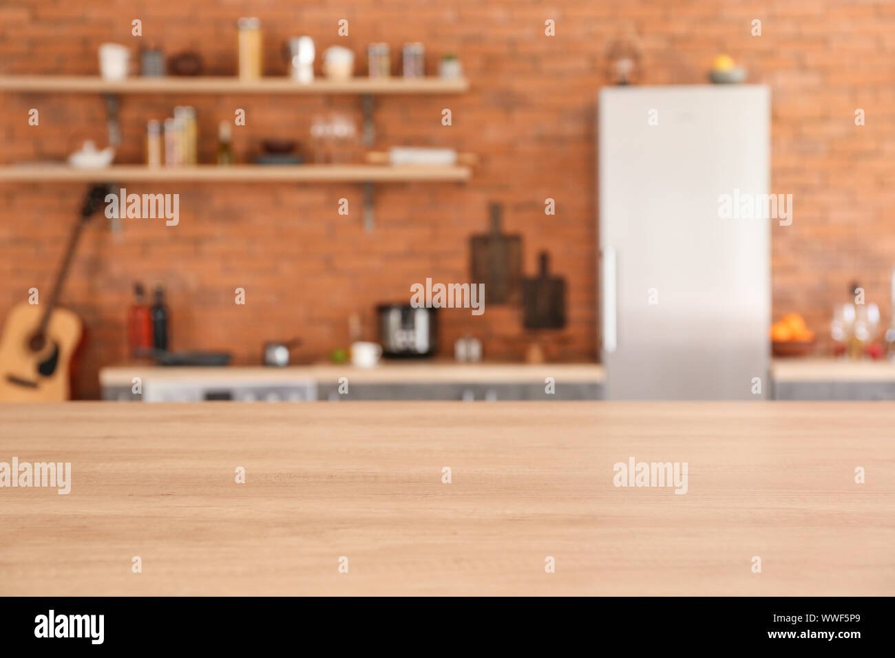 Wooden table in modern kitchen Stock Photo - Alamy