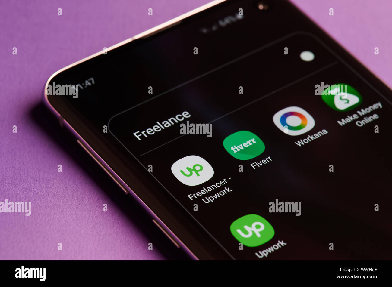 New york, USA - september 14, 2019:Apps for freelance work in smartphone screen close up view Stock Photo