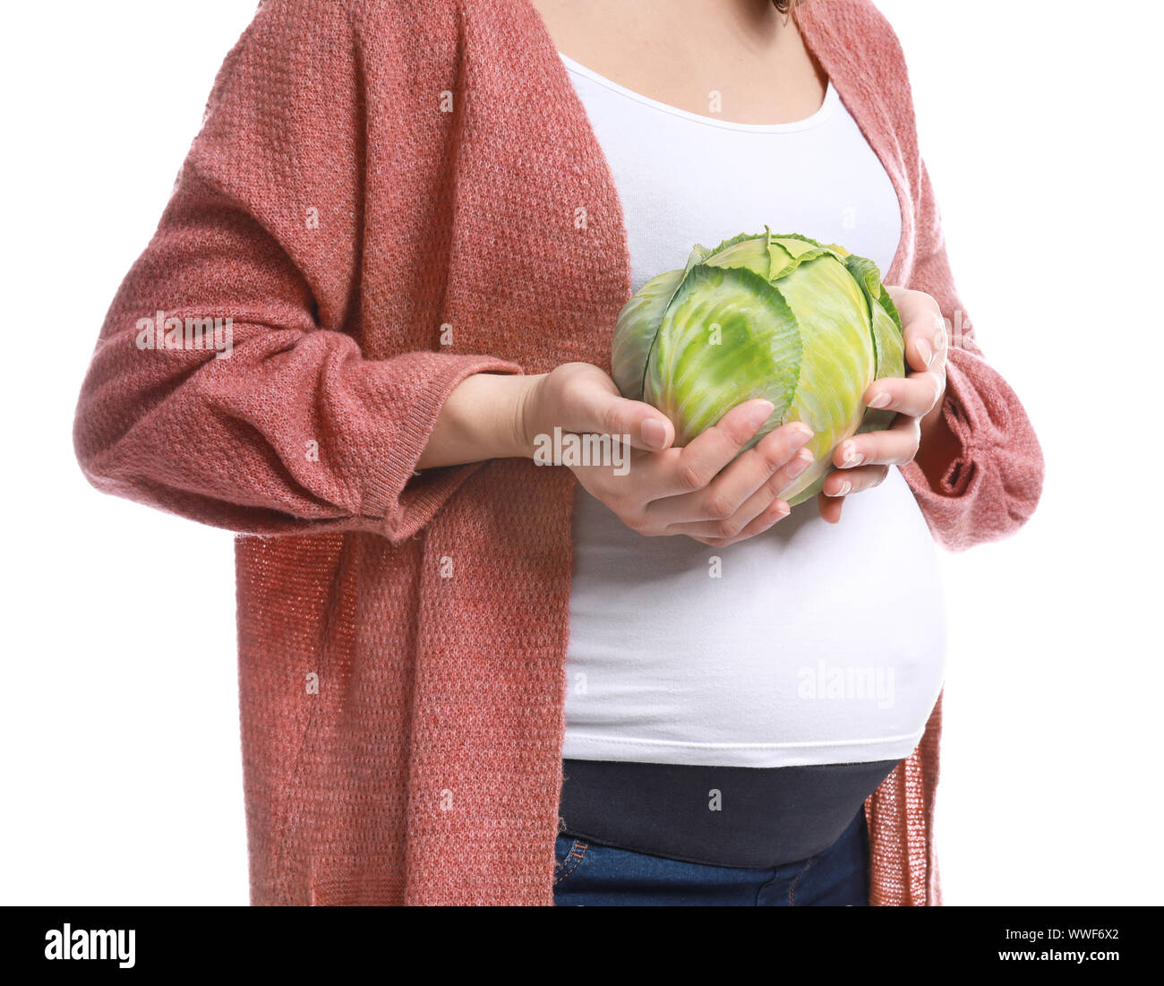 Beautiful pregnant woman with cabbage on white background Stock Photo