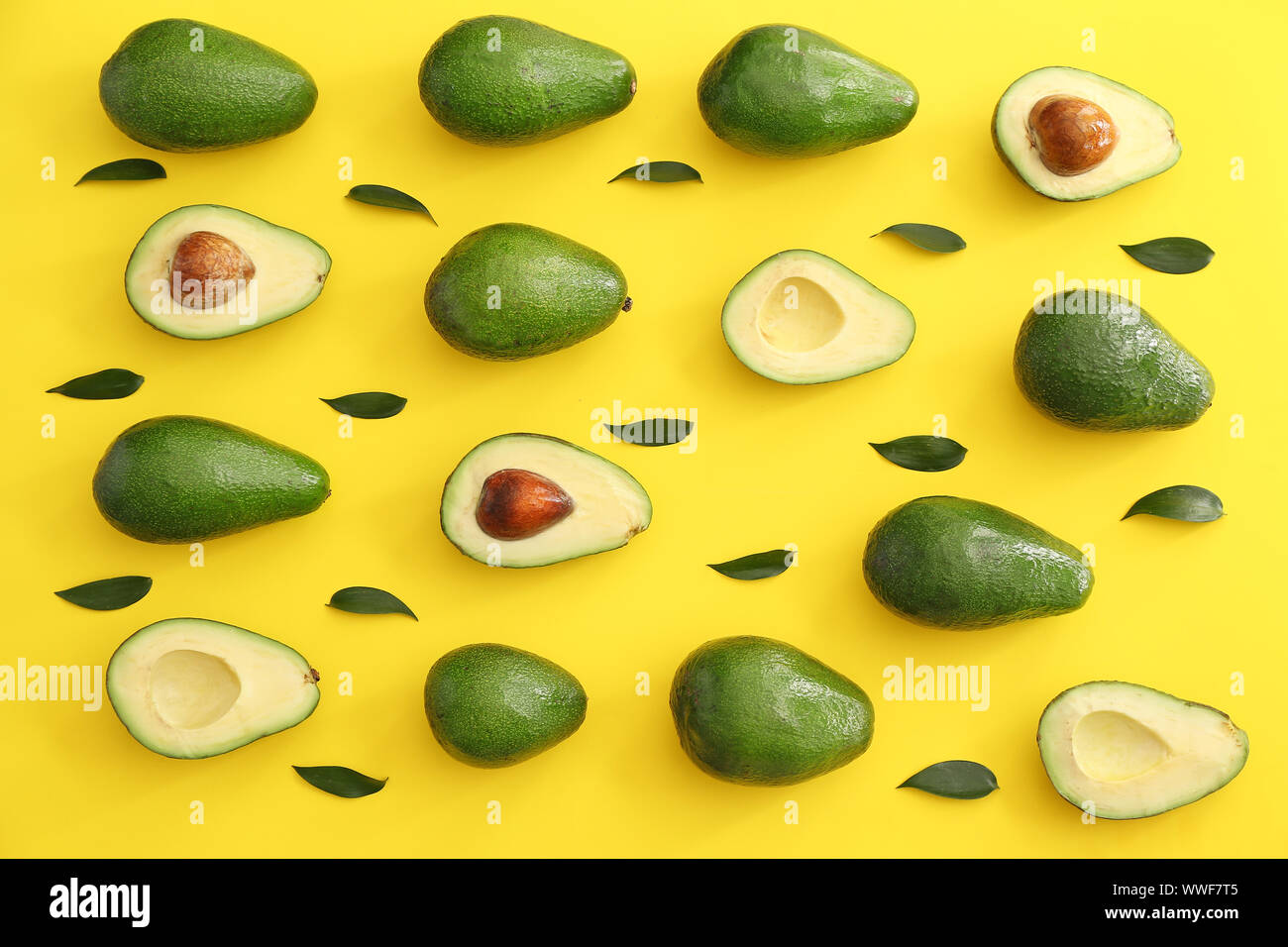 Avocado Ripened Color Fresh ripe avocados on color background Stock Photo - Alamy