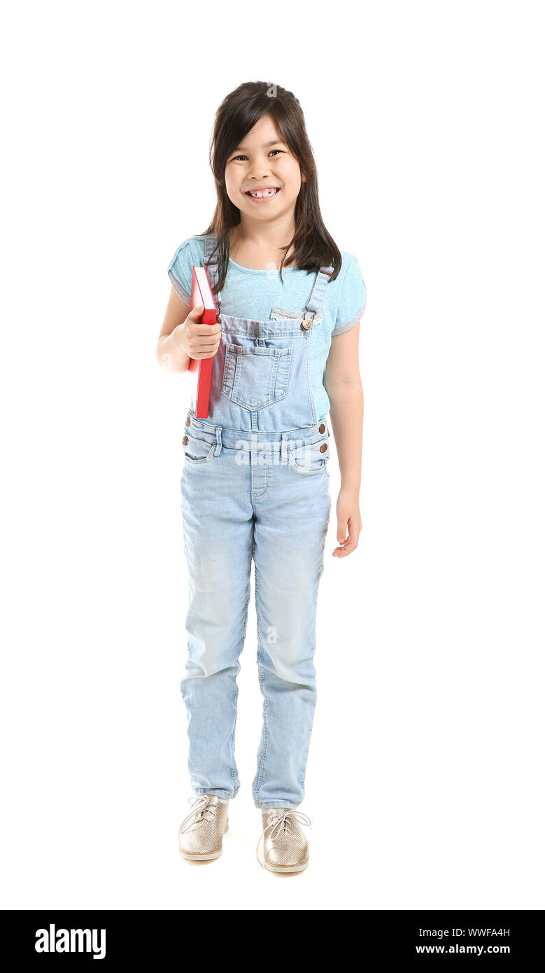 Portrait of cute little girl with book on white background Stock Photo ...